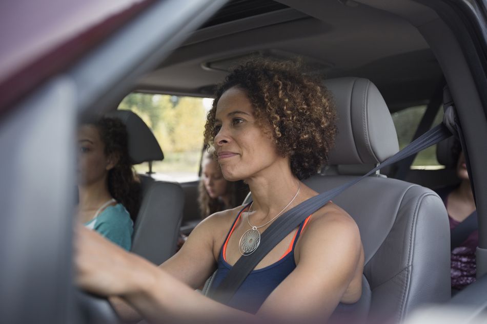 mother driving with children in the car