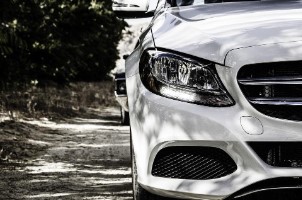 Front grill of white color car.