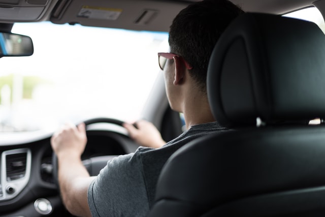 Man driving his car