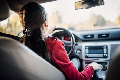 Woman driving a car.