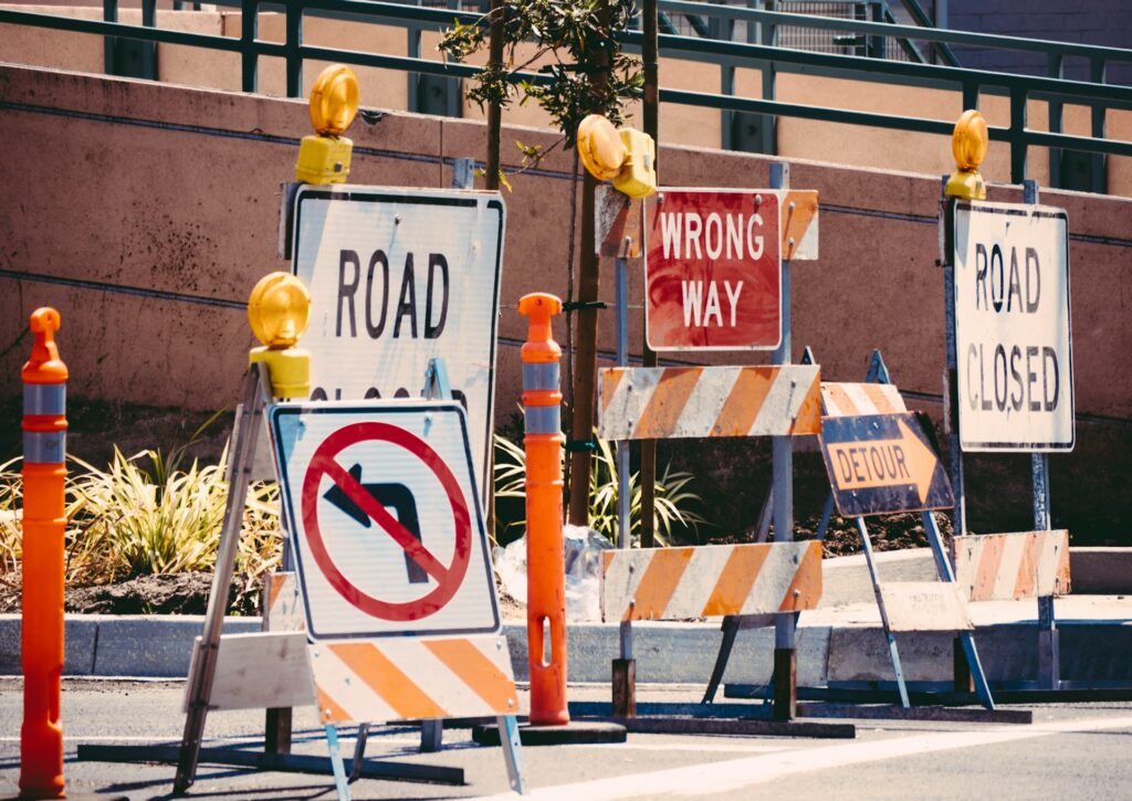 A collection of road signs, used for construction projects, displayed in Chicago.