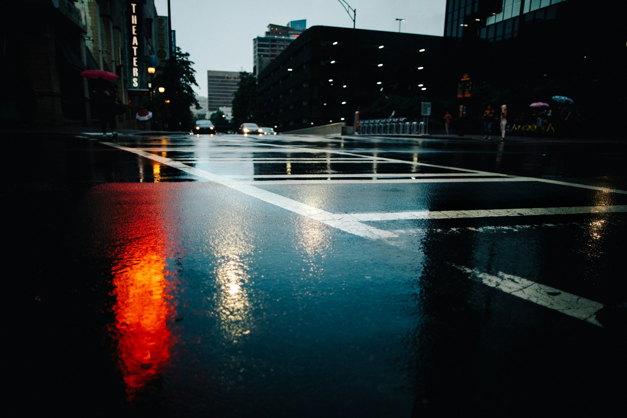 A wet, black asphalt road in Illinois where cars will hydroplane.