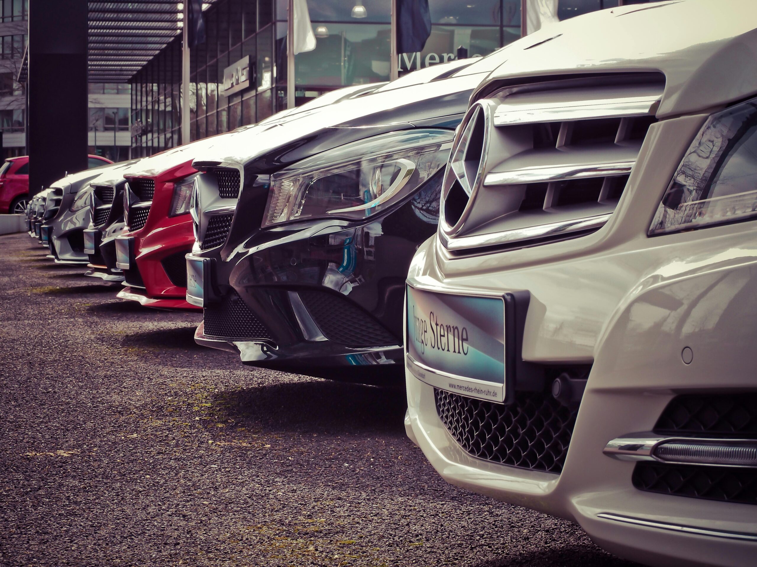 Cars in a row at dealer lot
